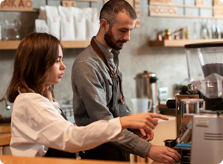 Baristas preparing coffee at Bean There
